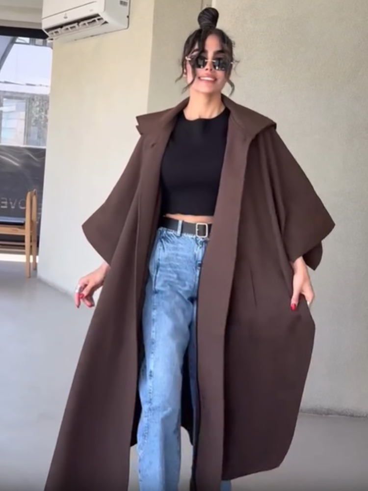 Vintage Fashion Style Female - เสื้อโค้ทแฟชั่นทรงเคปแบบยาวสำหรับผู้หญิง ทรงโอเวอร์ไซส์ มีฮู้ด พร้อมเข็มขัดผูกเอง แขนสามส่วนทรงกว้าง เสื้อโค้ทเทรนช์ใหม่สำหรับฤดูใบไม้ร่วง